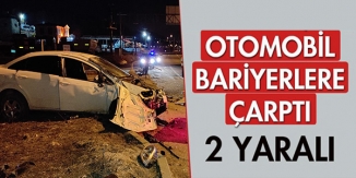 OTOMOBİL BARİYERLERE ÇARPTI, 2 YARALI !